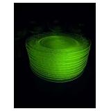 Lot of plates and glass that GLOW green