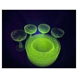 Lot of plates and glass that GLOW green