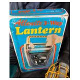 Lot of lantern, light, and sander