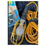 Lot of lantern, light, and sander