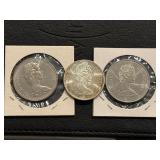 Canada Dollars and Silver Half Dollar