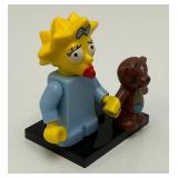 Collectible Hard To Get MAGGIE SIMPSON Genuine Lego Mini figure With Teddy Bear And Stand