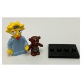 Collectible Hard To Get MAGGIE SIMPSON Genuine Lego Mini figure With Teddy Bear And Stand