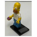 Collectible Hard To Get HOMER SIMPSON Genuine Lego Mini figure With Donut, TV Remote And Stand