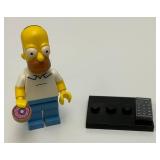 Collectible Hard To Get HOMER SIMPSON Genuine Lego Mini figure With Donut, TV Remote And Stand