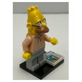 RARE Collectible Hard To Get GRAMPA SIMPSON Genuine Lego Mini figure With Newspaper And Stand