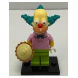 Collectible Hard To Get KRUSTY THE CLOWN Genuine Lego Mini figure With Pie,  And Stand