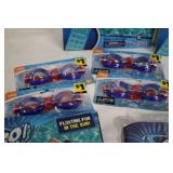 Pool loungers and inflatable arm ba...