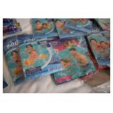 Pool loungers and inflatable arm ba...