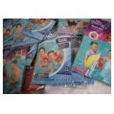 Pool loungers and inflatable arm ba...