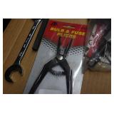 Wrench, Bulb & Fuse Pliers and Volkswagen Brake Caliper