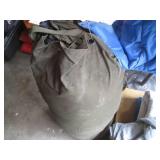 Army duffe full of assorted clothin...