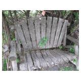 Rustic barnwood and metal wagon whe...
