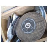 Wood box containing replacement saw...