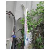 SNOW skis, poles and bow and arrow...