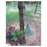Assortment of Fishing poles and emp...