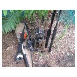 Assortment of Fishing poles and emp...