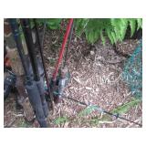 Assortment of Fishing poles and emp...
