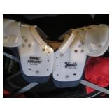 Football shoulder pads and other mi...