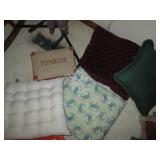 Stack of padded seat cushions...