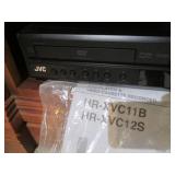 JVC DVD/VHS player combo with manua...