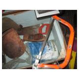 Vintage footlocker trunk, hand saws...