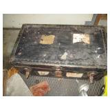 Vintage footlocker trunk, hand saws...
