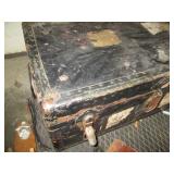 Vintage footlocker trunk, hand saws...
