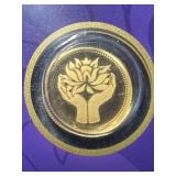1 GRAM .999 FINE GOLD PAMP ROUND CARDED