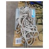 Waterspike boat anchor with rope.