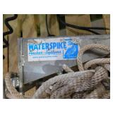 Waterspike boat anchor with rope.