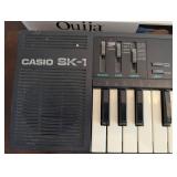 Casio Sk-1 Keyboard, Ouija Board & Checkers Game Set (Lot of 3)