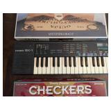 Casio Sk-1 Keyboard, Ouija Board & Checkers Game Set (Lot of 3)