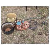 Lot of Garden Decor and Planters including Metal Buckets, Decorative Stakes, and Metal Pumpkin