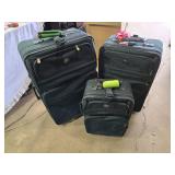 Set of Black Luggage with Wheels and Handles