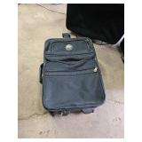 Set of Black Luggage with Wheels and Handles
