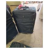 Set of Black Luggage with Wheels and Handles