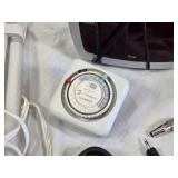 Various Electronics and Accessories Including Intermatic Timer, RCA Cables, and Battery Charger