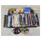 Lot of DVDs and Blu-rays including "Journey to the Center of the Earth 3D", "The Whole Nine Yards", and "Beethoven"
