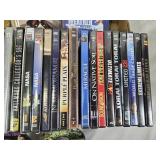 Lot of DVDs and Blu-rays including "Journey to the Center of the Earth 3D", "The Whole Nine Yards", and "Beethoven"