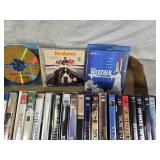 Lot of DVDs and Blu-rays including "Journey to the Center of the Earth 3D", "The Whole Nine Yards", and "Beethoven"