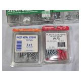 Assorted Hardware Fasteners Collection including Sheet Metal Screws, Stove Bolts, and Plastic Anchors