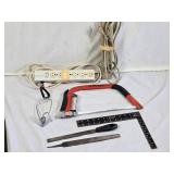 Assorted Tools and Accessories including Husky Hacksaw, Files, Speed Square, Extension Cords, and Power Strip