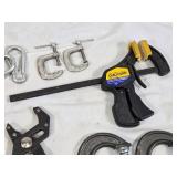 Assorted Hand Tools including Craftsman RoboGrip Pliers, C-Clamps, and Quick-Grip Clamp