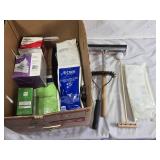 Box of Medical and Cleaning Supplies including BCool Gel Packs, Gauze Pads, and Squeegee, Wire Brush, and Others