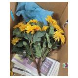 Box of Home and Garden Decor Items Including Decorative Flags, Artificial Flowers, Fabric, and Garden Tools