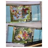 Box of Home and Garden Decor Items Including Decorative Flags, Artificial Flowers, Fabric, and Garden Tools