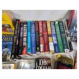 Collection of Books Including Mary Higgins Clark and John Grisham