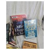 Collection of Books Including Mary Higgins Clark and John Grisham