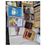 Collection of Books Including Mary Higgins Clark and John Grisham